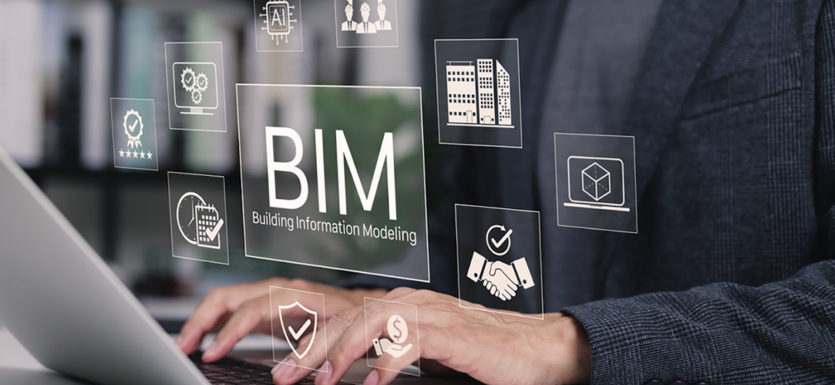 Someone typing on a computer with an icon with a BIM icon