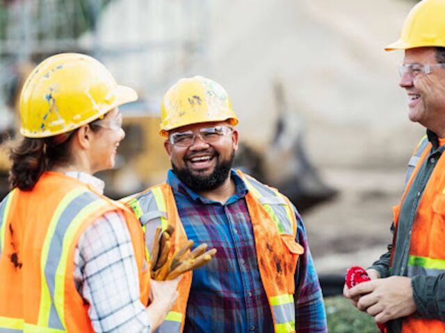 Electrical team chatting on a jobsite